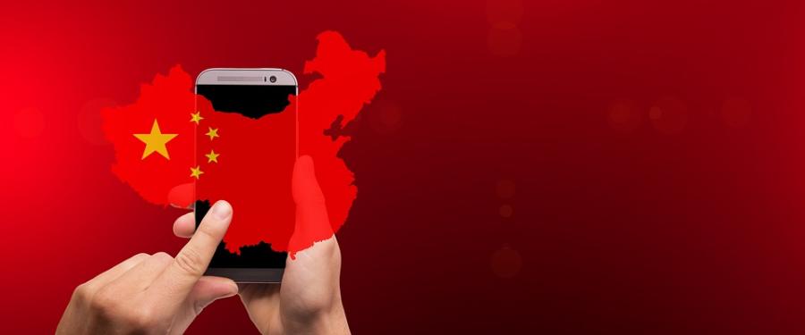 Map of China over a cell phone