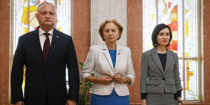 Moldova's president, speaker of the parliament, and prime minister stand together. Moldova's president, speaker of the parliament, and prime minister stand together.