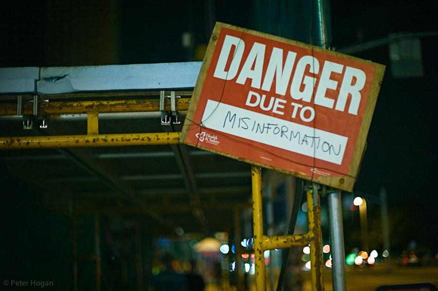 danger due to misinformation sign